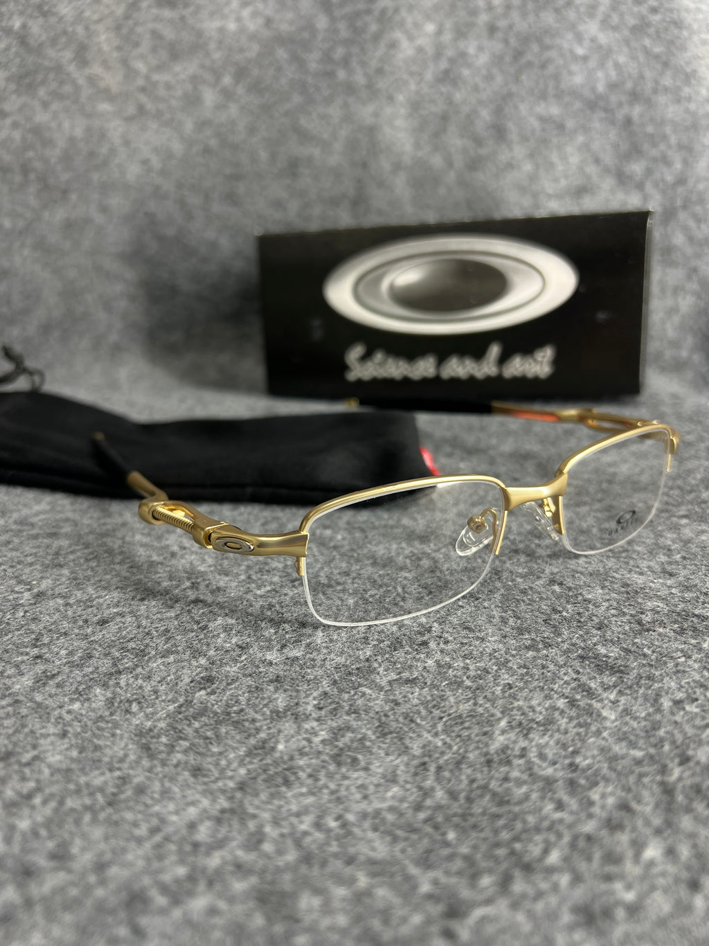 Armação Oakley Mola Dourada Lente Transparente