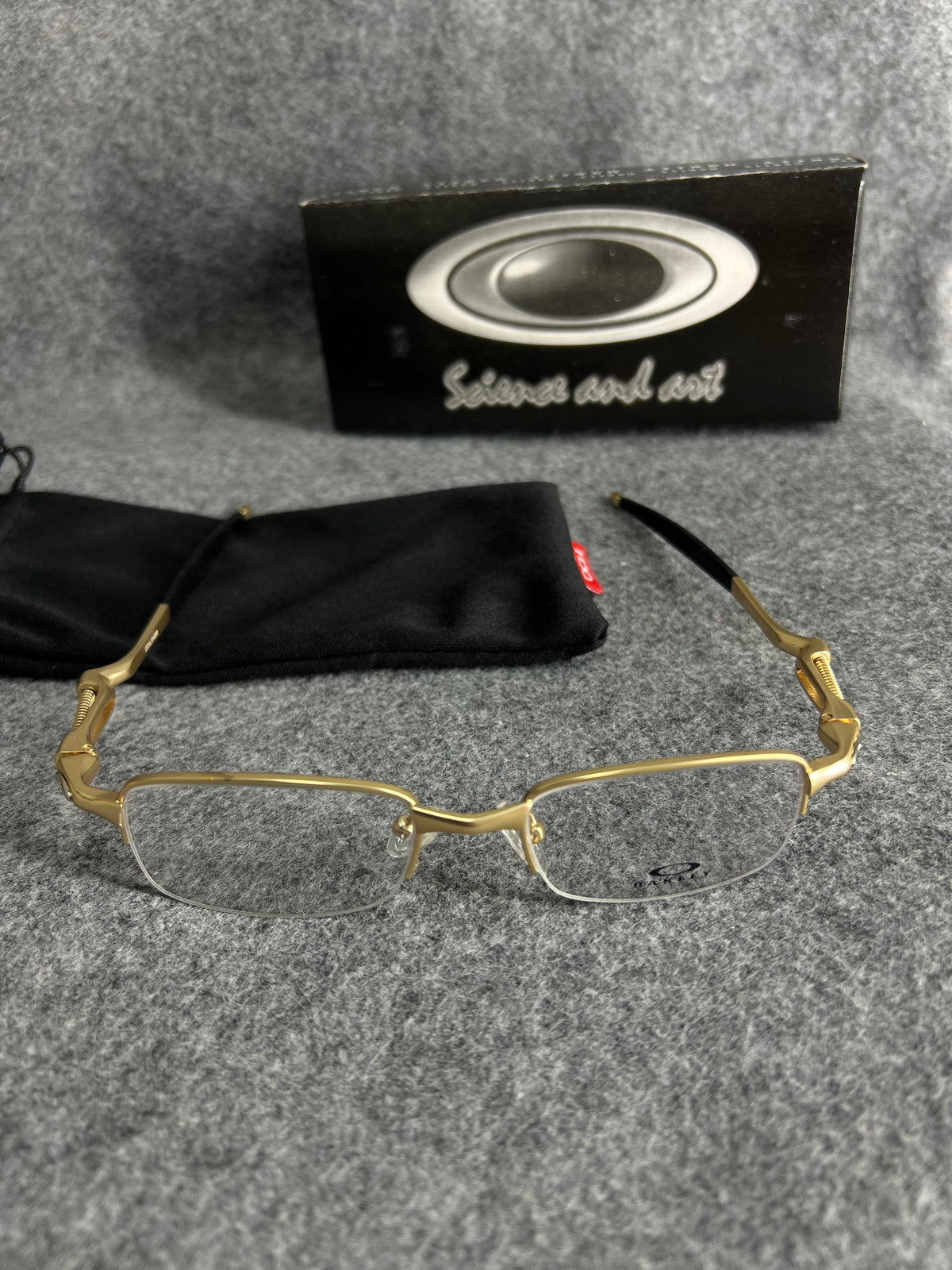 Armação Oakley Mola Dourada Lente Transparente