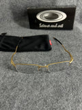 Armação Oakley Lente Transparente Dourada
