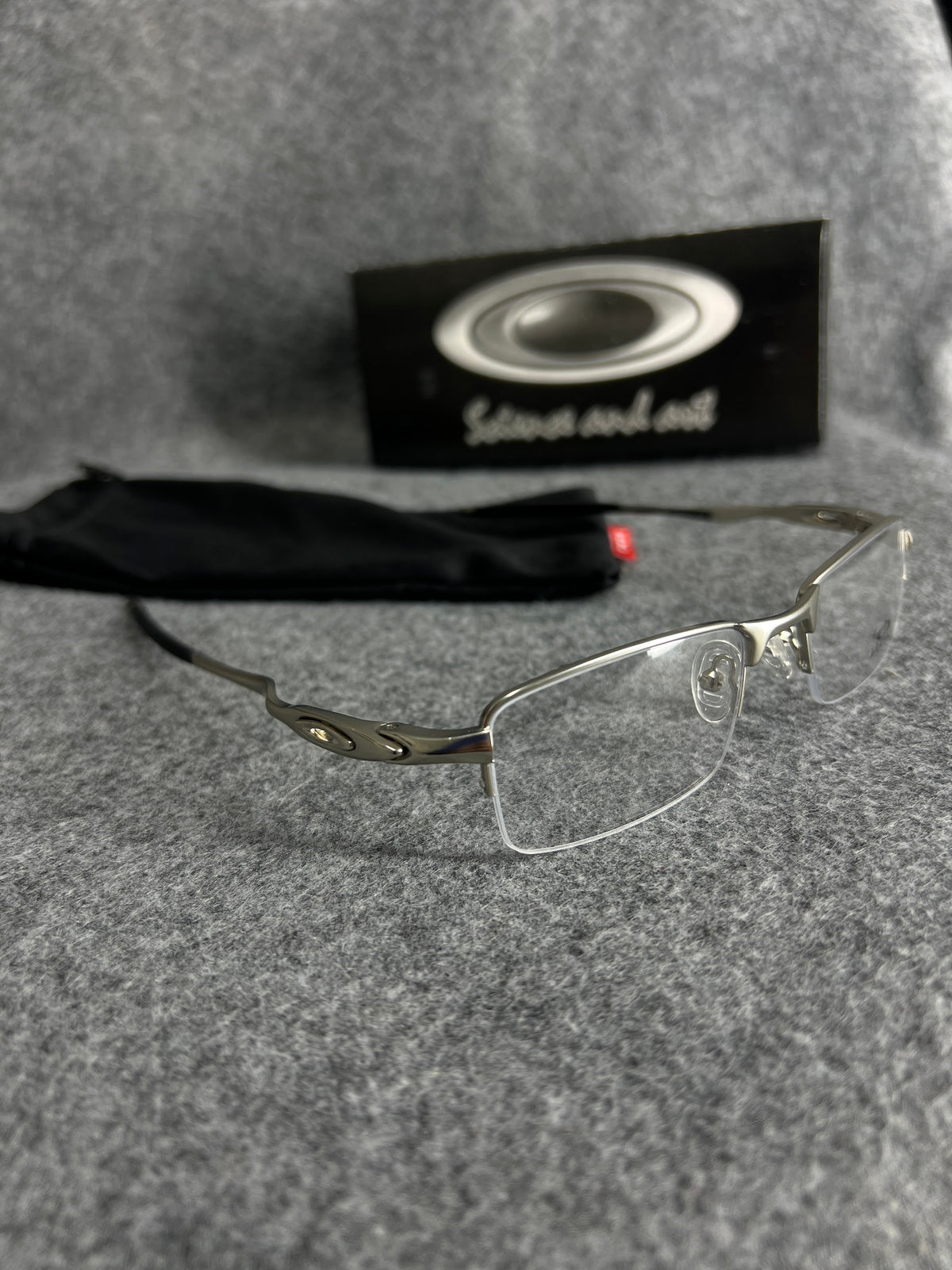 Armação Oakley Lente Transparente Prata