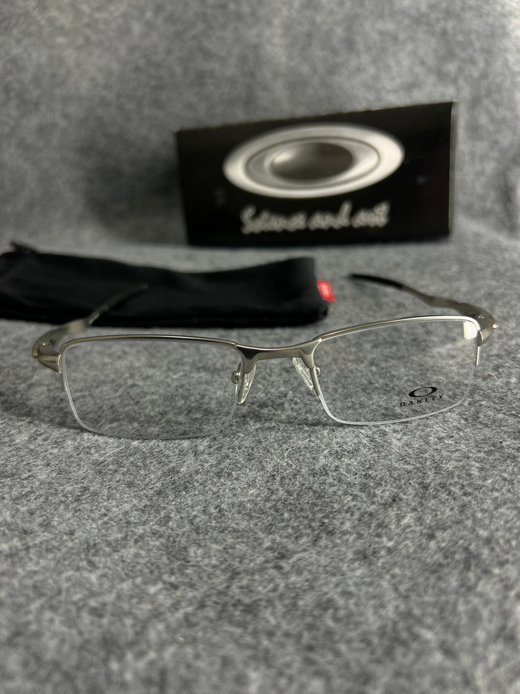 Armação Oakley Lente Transparente Prata