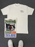 Camiseta Via Cruz Primeiro Trave do Teu Olho Off White